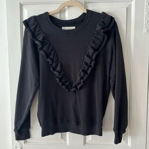 The GREAT. Shrunken Ruffle Sweatshirt in Washed Black. Size 2